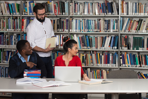 Library Sleep Programs Students Sleeping In Library Stock Photo - Download Image Now - 20-24 ...