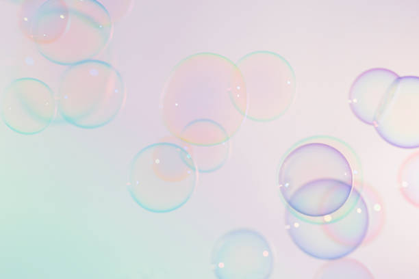 istock Beautiful blur transparent colorful soap bubbles background. 1298048013