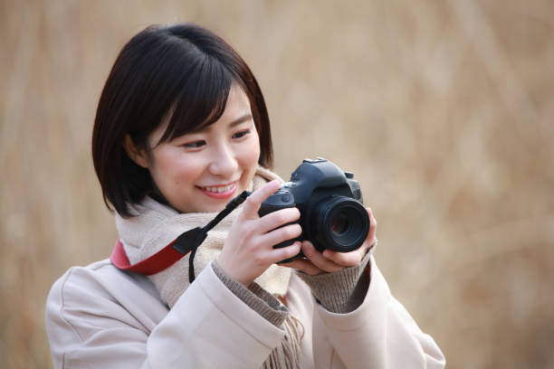 istock Woman taking a picture 1298052472