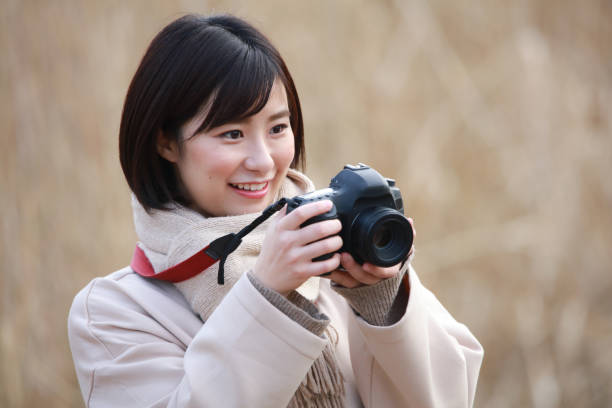 istock Woman taking a picture 1298052484