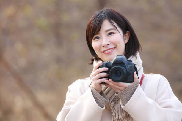 istock Woman taking a picture 1298052588