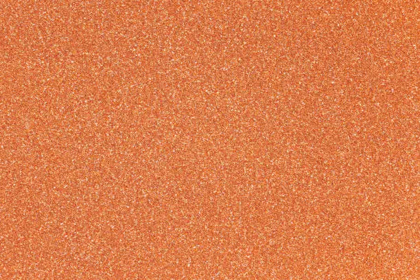 Orange glitter texture background