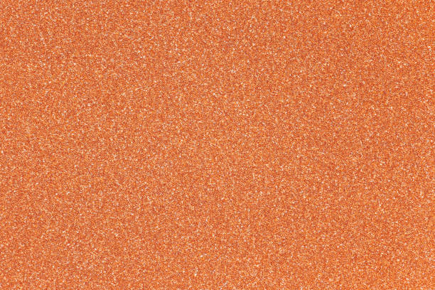 оранжевый блеск текстуры фона - lame стоковые фото и изображения
