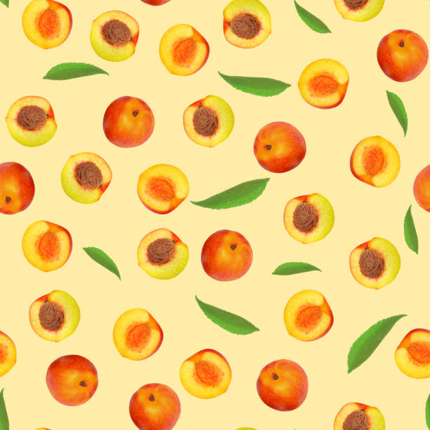 istock Seamless pattern, peaches and green leaves on a light beige background. 1298056984