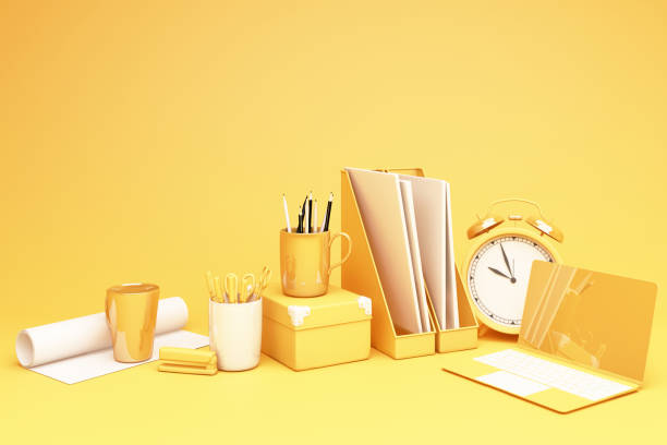 istock yellow laptop and wokring table set 3d rendering 1298059753