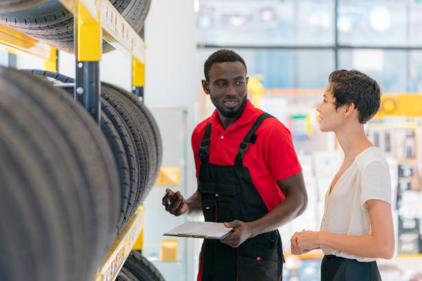 istock A mechanic talking to female customer 1298062934