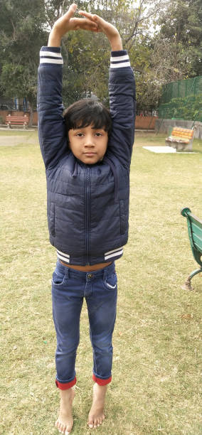 istock Handsome Young Boy playing in the playground. 1298064125