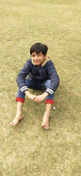 istock Handsome Young Boy playing in the playground. 1298064133