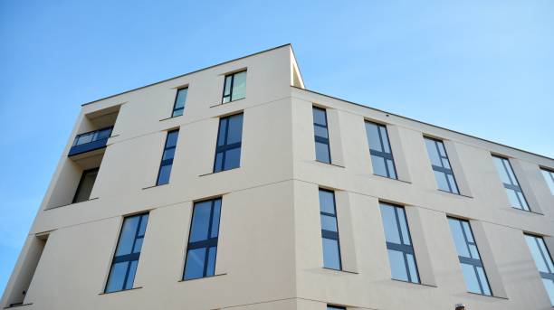 istock Modern apartment buildings on a sunny day with a blue sky 1298069447