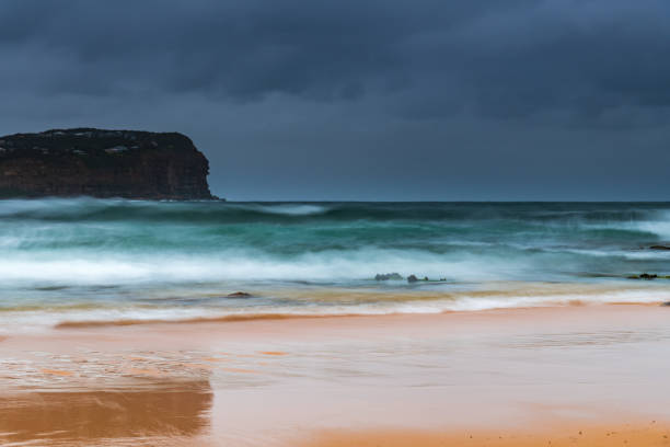 istock Wet weather sunrise seascape 1298070066