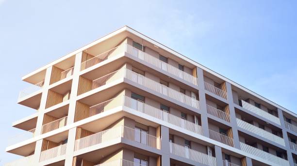 istock Modern apartment buildings on a sunny day with a blue sky 1298070232