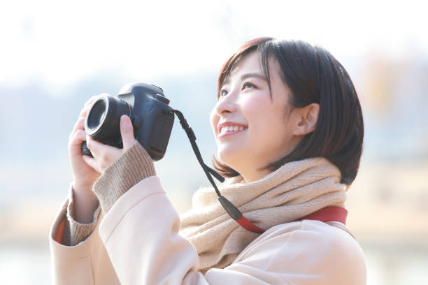 写真を撮る女性 - hobbies ストックフォトと画像