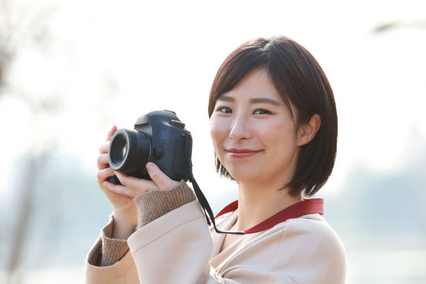 istock Woman taking a picture 1298070326