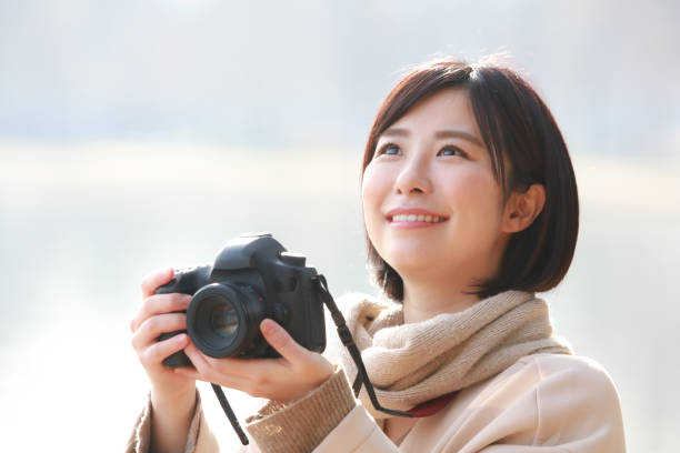istock Woman taking a picture 1298070333