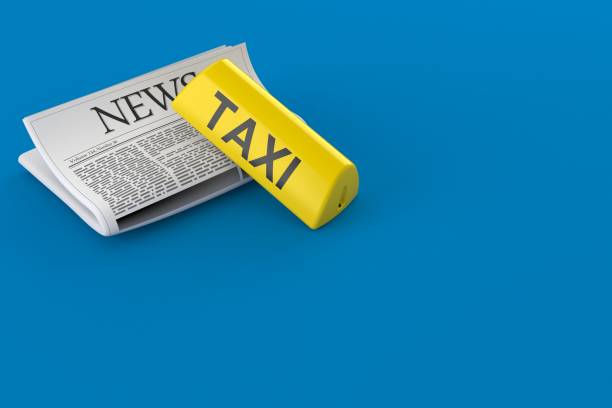 istock Taxi light with newspaper 1298079412