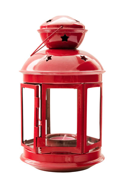 istock Red metal lamp with a candle isolated on a white background. Red lamp on a white background. Vintage red lamp with candles isolated on white background. 1298080700