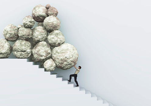 Hombre empujando piedras en las escaleras. Difíciles múltiples tareas . Problemas financieros . Esta es una ilustración de renderización 3D. photo
