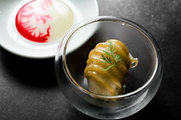 istock Molecular gastronomy, beautiful dessert dish with decoration. Exquisite dish, creative meal concept. 1298081271