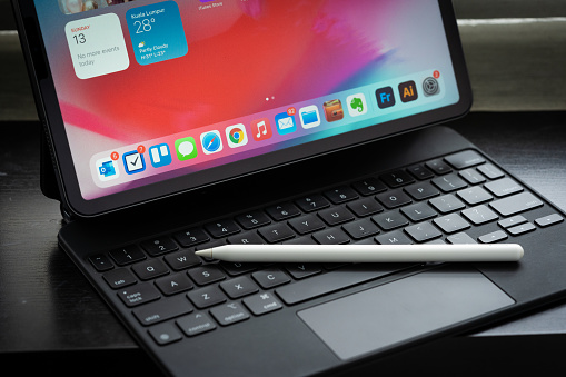 Kuala Lumpur, Malaysia - December 2020. Apple Ipad pro 2020 11 inch with Magic Keyboard and Apple Pencil