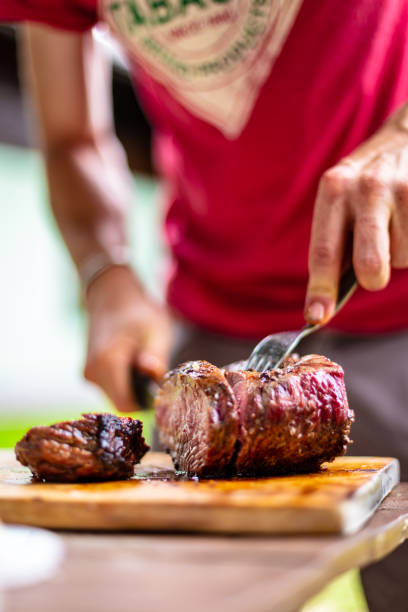 istock barbeque meat preparation in a summer day 1298083958