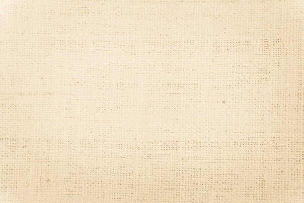 istock Brown Hemp rope texture background. Sackcloth or blanket wale linen wallpaper. Rustic sack canvas fabric texture in natural. Haircloth vintage linen burlap weaving, Old beige carpet background. 1298084047