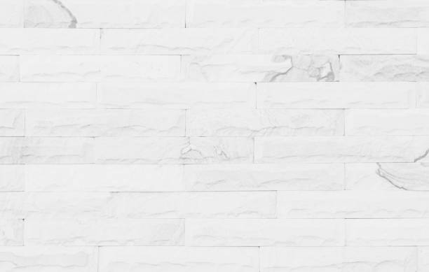 istock White grunge brick wall texture background for stone tile block painted in grey light color wallpaper modern interior and exterior and room backdrop design 1298084262