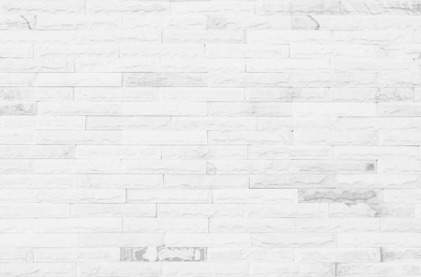 istock White grunge brick wall texture background for stone tile block painted in grey light color wallpaper modern interior and exterior and room backdrop design 1298084266