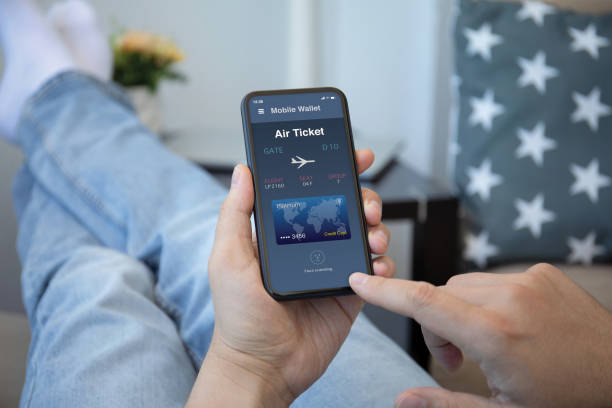 istock male hands holds phone with airplane ticket application airlines screen 1298086604