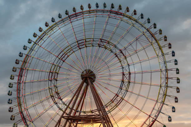 istock ferris wheel against the sky 1298088258
