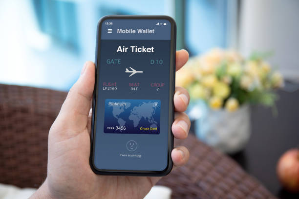 istock male hand holds phone with airplane ticket application airlines screen 1298088325