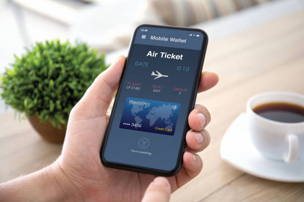 istock male hands holds phone with airplane ticket application airlines screen 1298089034