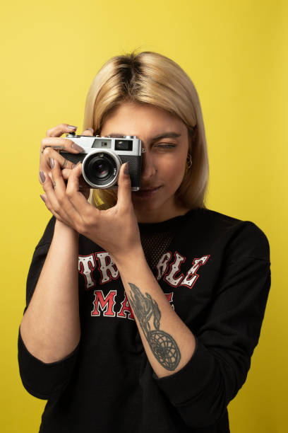 istock Girl portrait on yellow background 1298091322