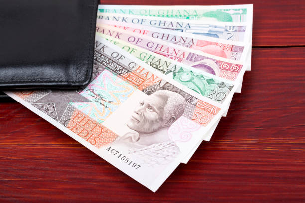 istock Old Ghanaian Cedis in the black wallet 1298091329
