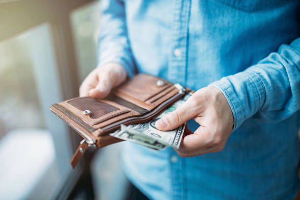 istock The man is counting money 1298094066