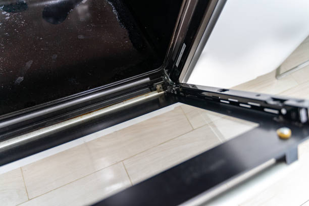 istock cleaning a dirty oven in the kitchen 1298094101