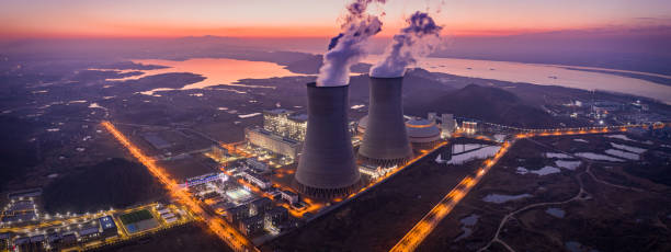 thermal power station - industry dusk night sustainable resources stock-fotos und bilder