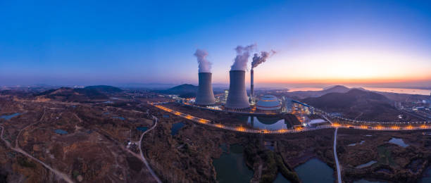 thermal power station - industry dusk night sustainable resources stock-fotos und bilder