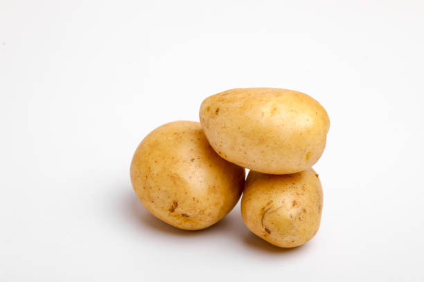 istock Potatoes isolated on white background. Top view 1298100726