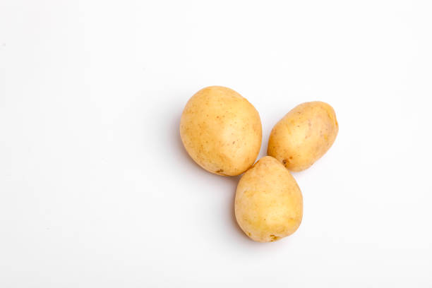 istock Potatoes isolated on white background. Top view 1298100798