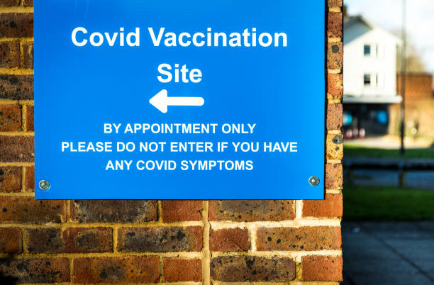 istock Sign outside Covid-19 vaccination centre 1298102377