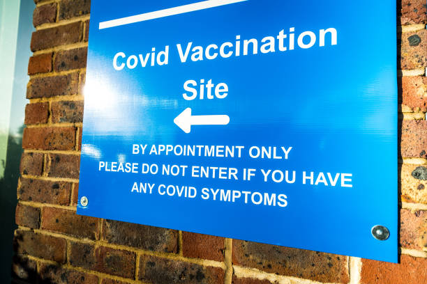 istock Sign outside Covid-19 vaccination centre 1298102416