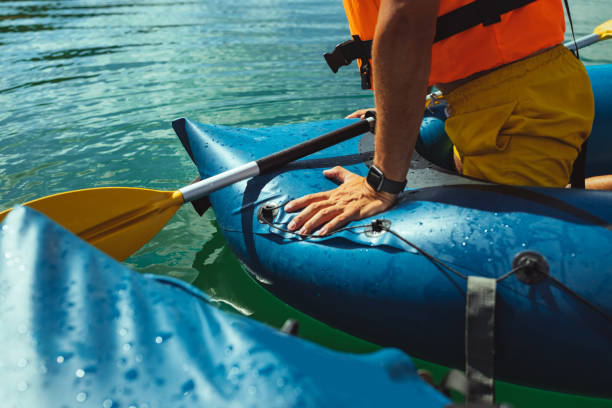 istock Man spending day on lake in rubber boat 1298105405