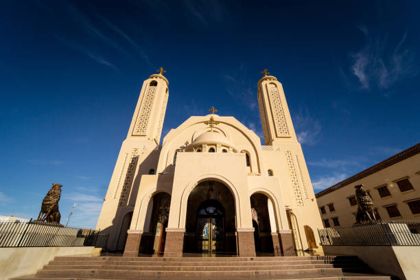 istock Public cathedral coptic egyptian church at the sky background 1298106892