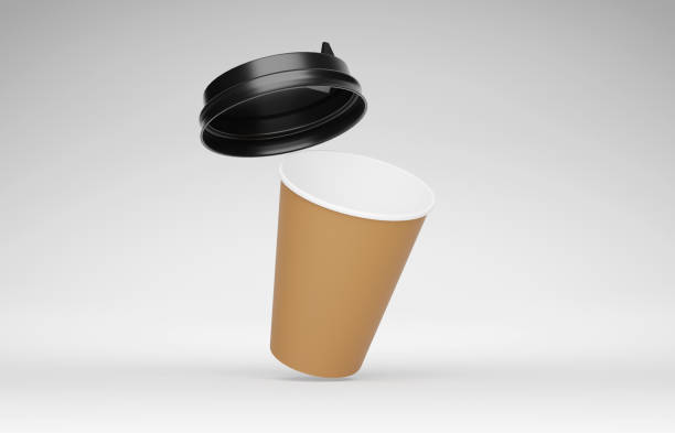 istock coffee cup with a lid mockup. Isolated on white 1298107658