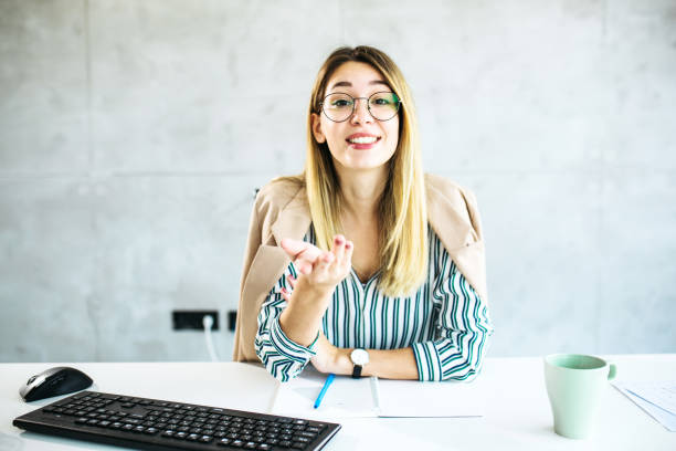 istock Beautiful female working from home 1298108032