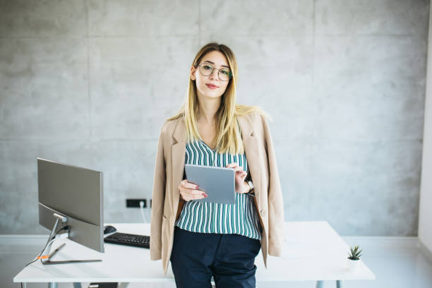 istock Beautiful female working from home 1298109203