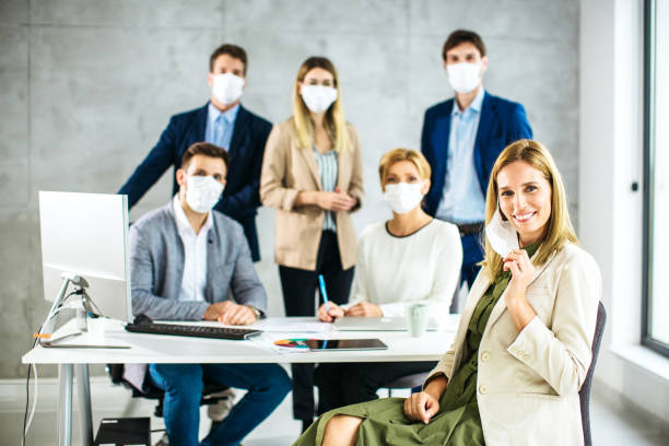istock Group of business people working inside modern office 1298109647