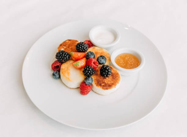 istock cheese pancakes dish berries sour cream honey 1298115250
