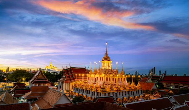 istock Golden metal castle illuminated, Wat Ratchanatdaram Woravihara, Loha Prasat temple 1298116446