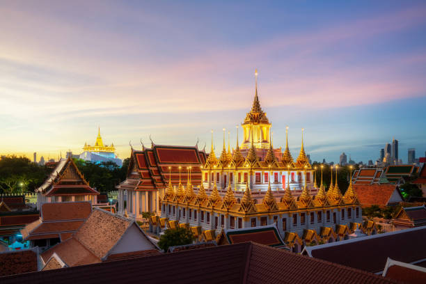 istock Golden metal castle illuminated, Wat Ratchanatdaram Woravihara, Loha Prasat temple 1298116500